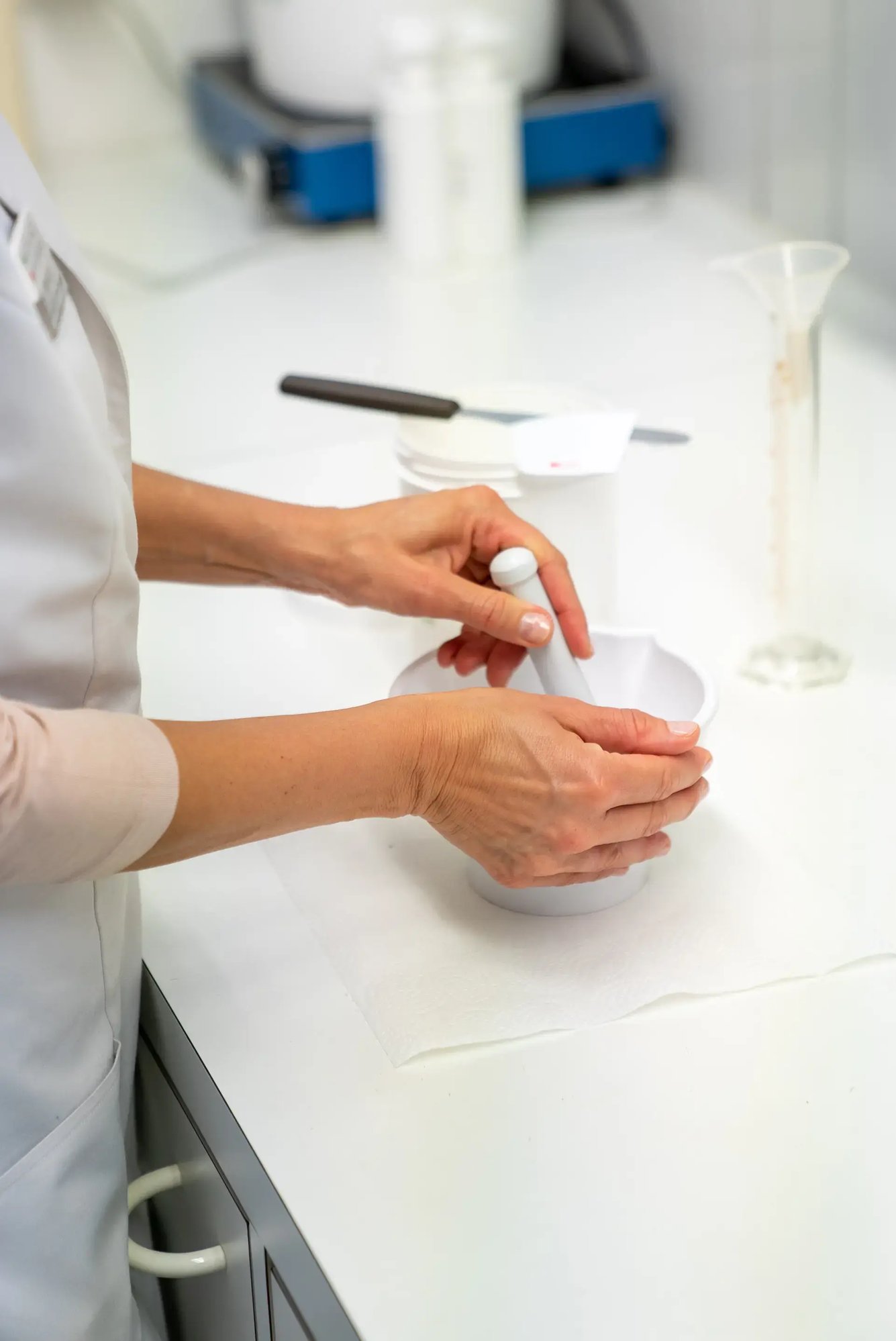 pharmacy-technician-compounding-medication-with-mortar-and-pestle pharmacy-technician-compounding-medication-with-mortar-and-pestle